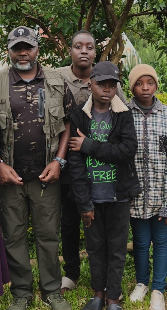 Mitchell Cheruto at home with her family